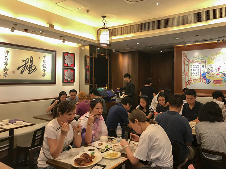 Eager diners enjoying their much anticipated meal at Kam’s.