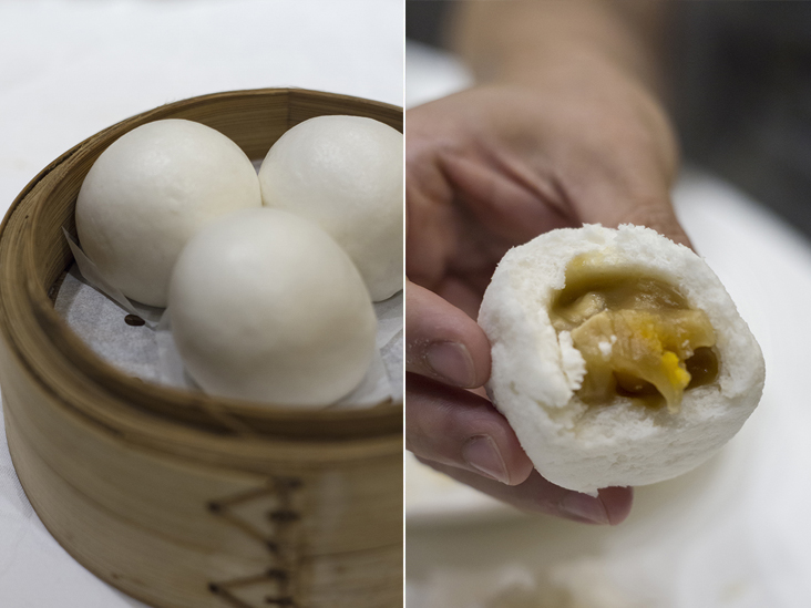 Steamed lotus seed paste buns with salted egg yolk (danwong linyong bao) (left). The “lava” oozing out of the danwong linyong bao (right)