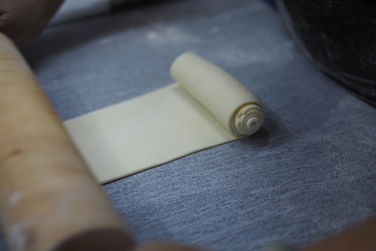 The Shanghai mooncake has many flaky layers of pastry