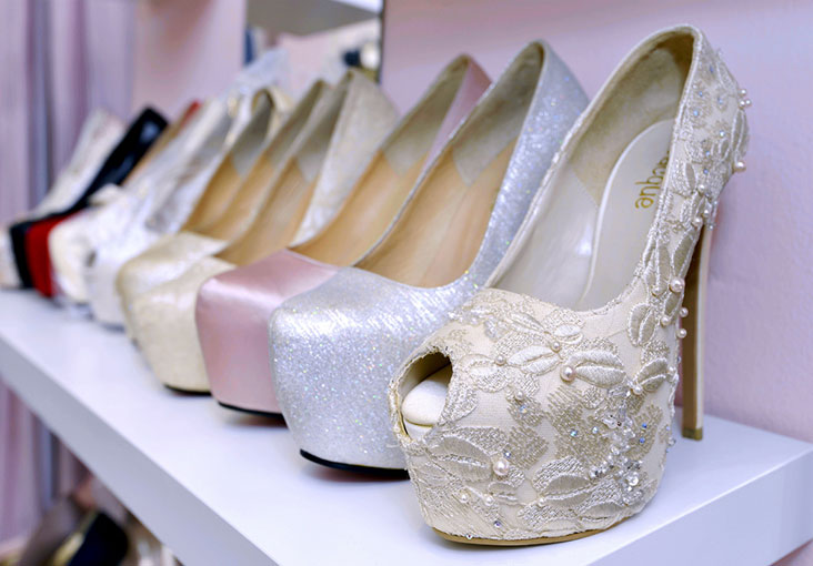 Details matter down to your shoes like this bridal pair of heels covered in lace.