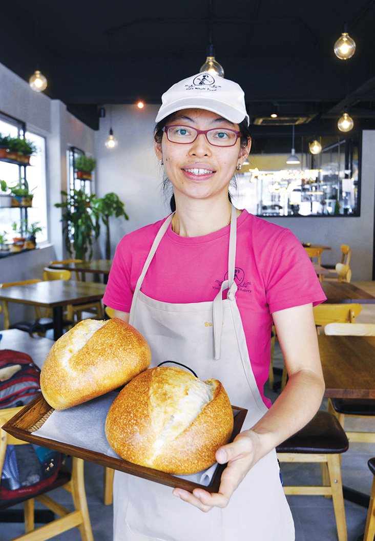 Yin’s Sourdough Bakery co-founder Chan Su Yin with their freshly baked sourdough bread, made everyday