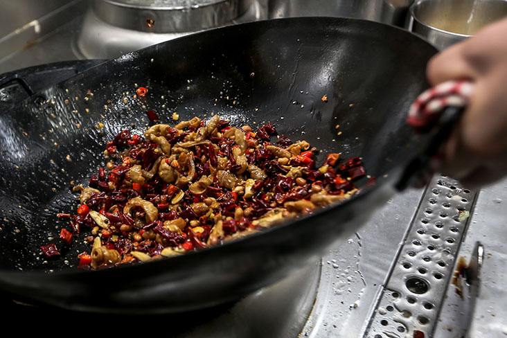 Full of flavour, this Sichuan dish is stir fried with an abundance of red chillies, Sichuan peppercorn, peanuts and garlic.