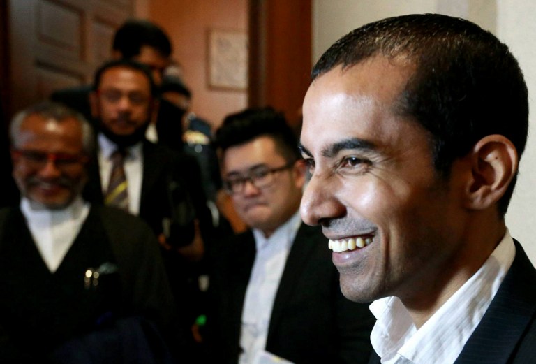 Dominic Bird smiles after being acquitted of drug trafficking by a Malaysian court for alleged possession of 167g of methamphetamine and drug trafficking, at the High Court in Kuala Lumpur on September 4, 2013. u00e2u20acu201c AFP pic