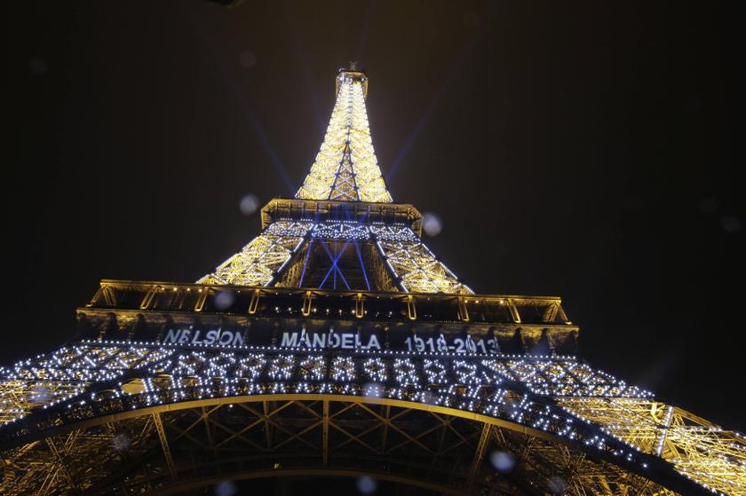 The Eiffel Tower is lit up in a memorial to late former South African President Nelson Mandela, during a rehearsal in Paris December 14, 2013. u00e2u20acu201d Reuters pic