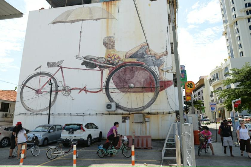 Ernest Zacharevic became famous two years ago for his wall murals all over George Town which he painted as part of the George Town Festival 2012. u00e2u20acu201d Picture by K.E. Ooi