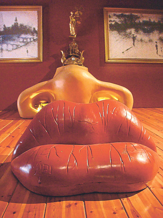 From the right angle, Mae West’s face looks back at you in the room named after her