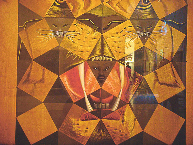 Depending on how far you are from it, Fifty Abstract Paintings will either show you three Chinese-looking Lenins or the head of a Bengal tiger