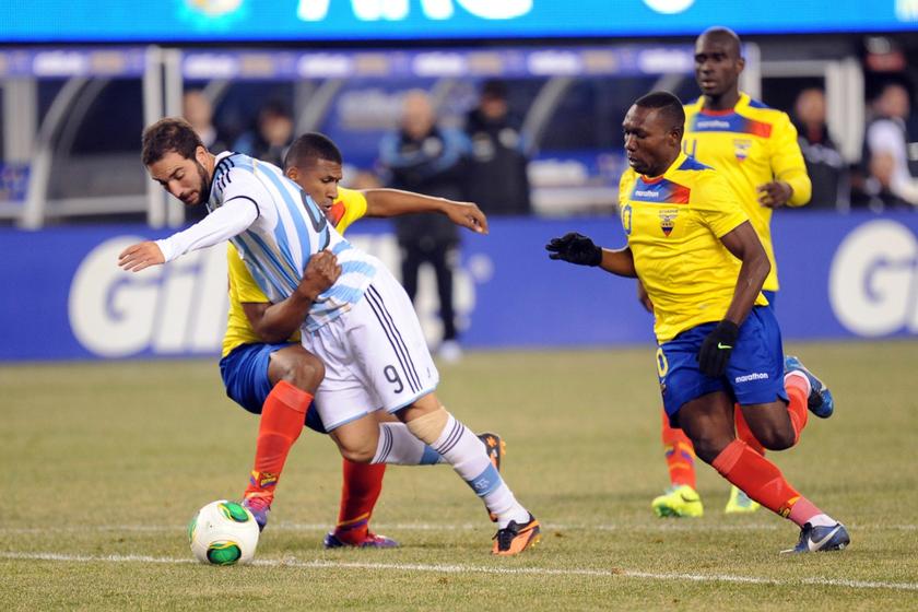 East Rutherford, NJ, USA; Ecuador midfielder Jorge Guagua (2) tackles Argentina forward Gonzalo Higuain (9) during the second half at MetLife Stadium. The match ended in a 0-0 draw. u00e2u20acu201d Reuters pic