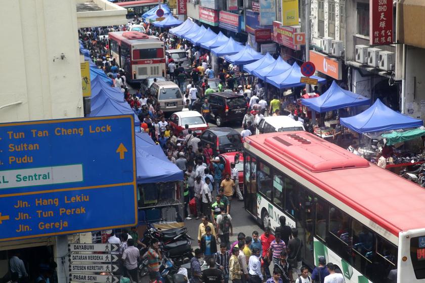 Foreign workers crowd the streets at Jalan Tun Tan Siew Sin (Jalan Silang) during the second day of Raya, August 9, 2013. u00e2u20acu201c Picture by Choo Choy May 
