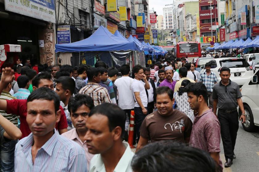 Foreign workers crowd the streets at Jalan Tun Tan Siew Sin (Jalan Silang) during the second day of Raya, August 9, 2013. u00e2u20acu201c Picture by Choo Choy May 