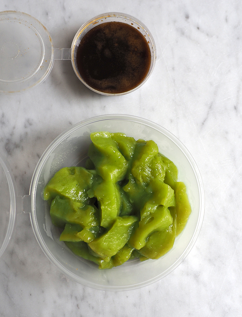 The 'tee nya kuih' may appear to be one lump but just drizzle the syrup and gently pull them away.