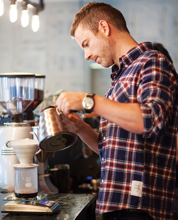 Harry Grover brewing coffee with precision and care