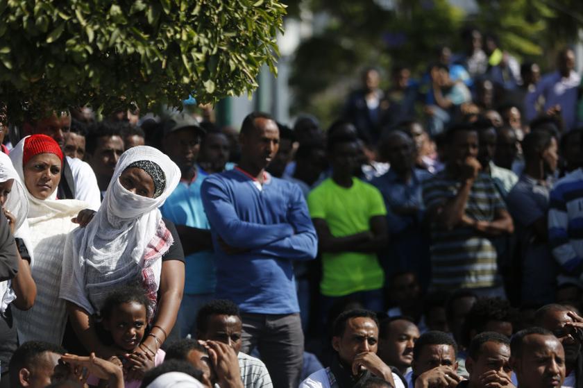African migrants watch a memorial service for the deaths of hundreds of migrants in last week's Lampedusa boat disaster, in Tel Aviv October 12, 2013. u00e2u20acu201d Reuters pic