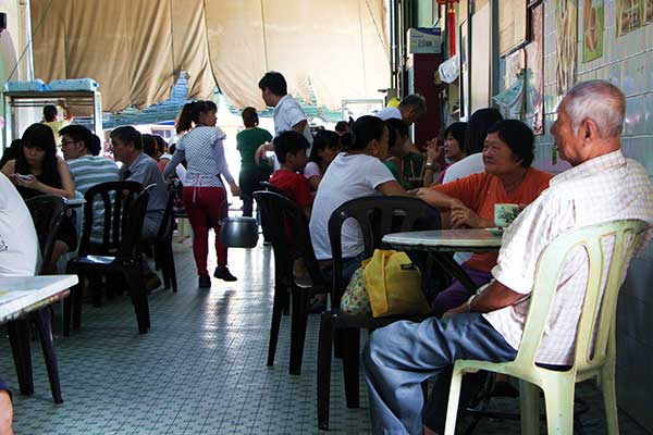 Regulars enjoying the famous Ipoh white coffee at Sin Yoon Loong at Jalan Bandar Timah