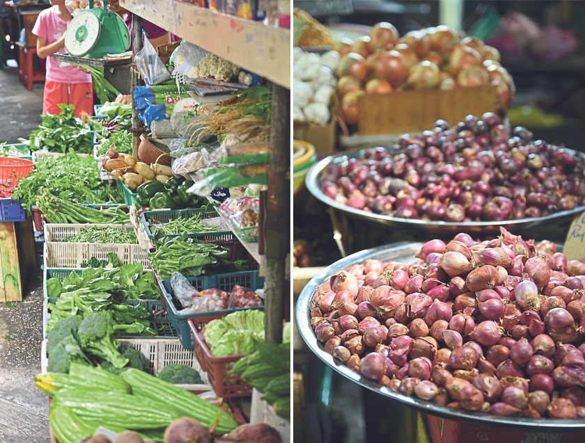 The colourful sight of fresh vegetables at Pasir Puteh (left). Mountains of purple shallots can be found at the stall in Pasir Puteh (right)