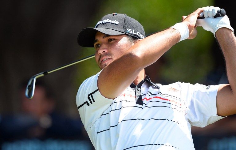 Jason Day of Australia tees off during the third round of Golf World Cup tournament played at the Royal Melbourne course in Melbourne, on November 24, 2013. u00e2u20acu201d AFP pic