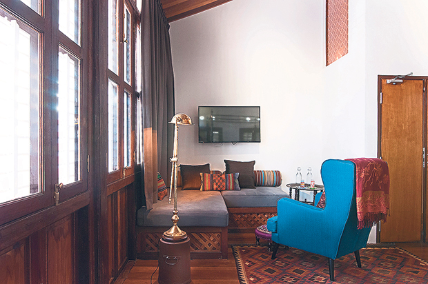 The comfortable sitting area in the family suite for guests to relax.