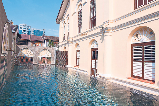 The water feature next to the mansion.