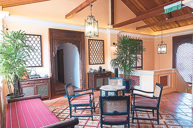 The sitting area upstairs for guests to make their own coffee and drinks.