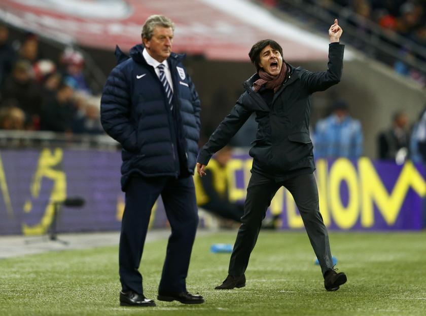 Germany's coach Joachim Loew (right) celebrates next to England's manager Roy Hodgson after their international friendly football match at Wembley Stadium in London November 19, 2013. u00e2u20acu201d Reuters pic