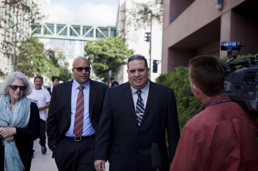 Navy Commander Jose Luis Sanchez (right) arrives at the US District Court in San Diego, California November 20, 2013. u00e2u20acu201d Reuters pic