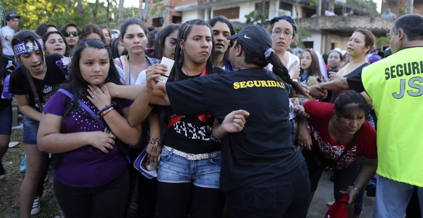 Security hold back fans of singer Justin Bieber before his performance during his Latin America tour concert at the Jockey Club in Asuncion November 6, 2013. u00e2u20acu201d Reuters pic