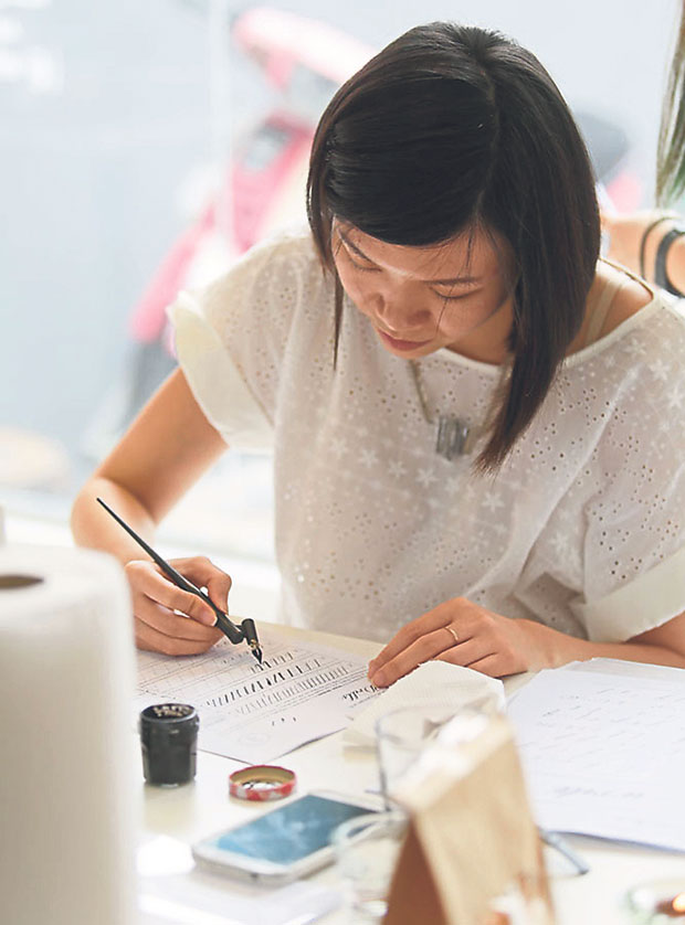 A participant in the workshop, concentrating on getting it right