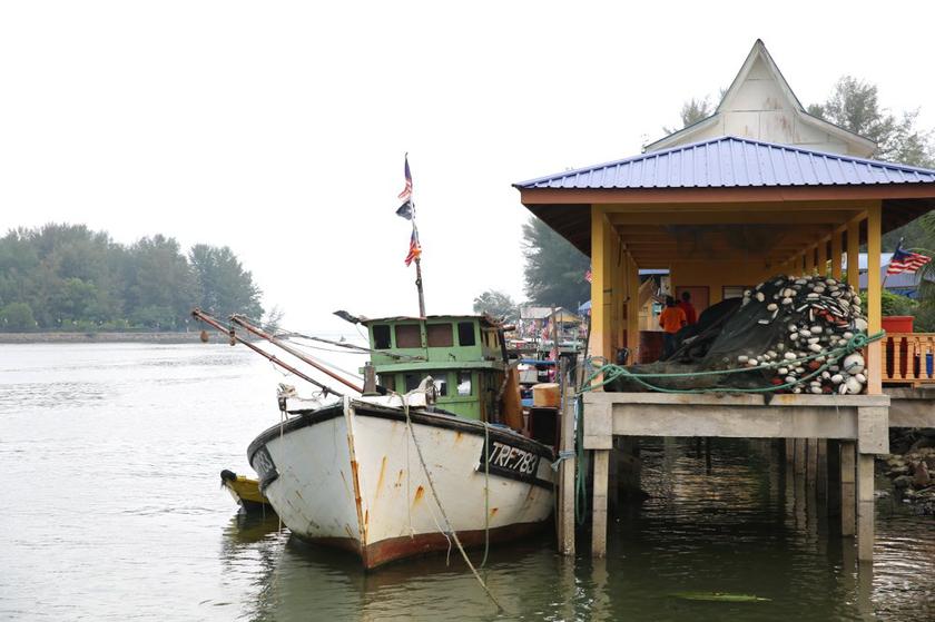 There are only about 100 boats at this fishing village in Kerteh. Many youths have gone to work in Petronas plants, leaving just the veterans in the fishing business, according to a fisherman.