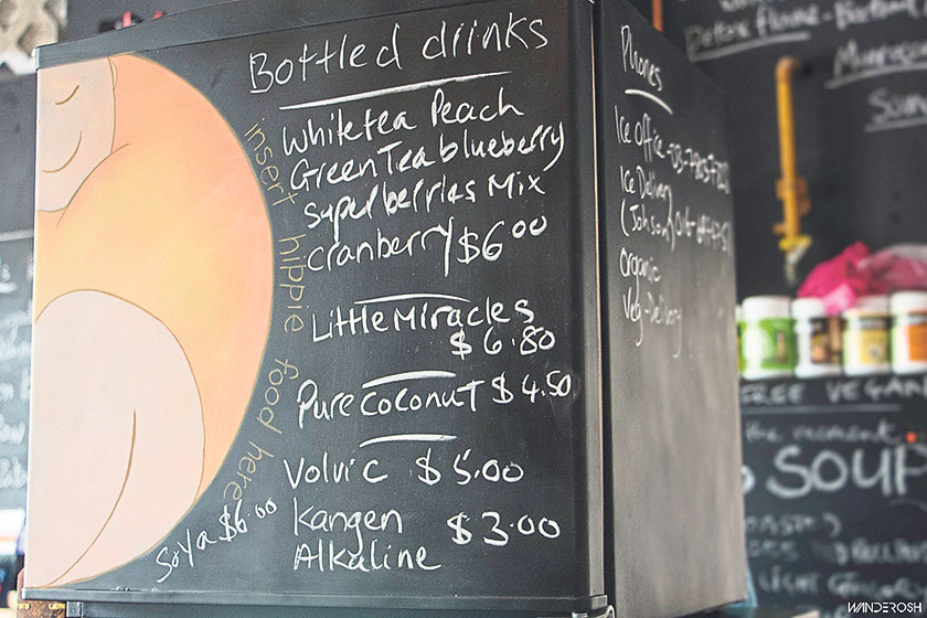 The cafe’s decor and menu board reflect its owners’ artistic inclinations