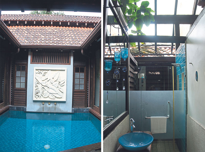 The plunge pool that takes centrestage at Kuang Kampung Retreat (left). The semi-open air bathrooms are punctuated by small gardens with leafy trees growing through the roof (right)