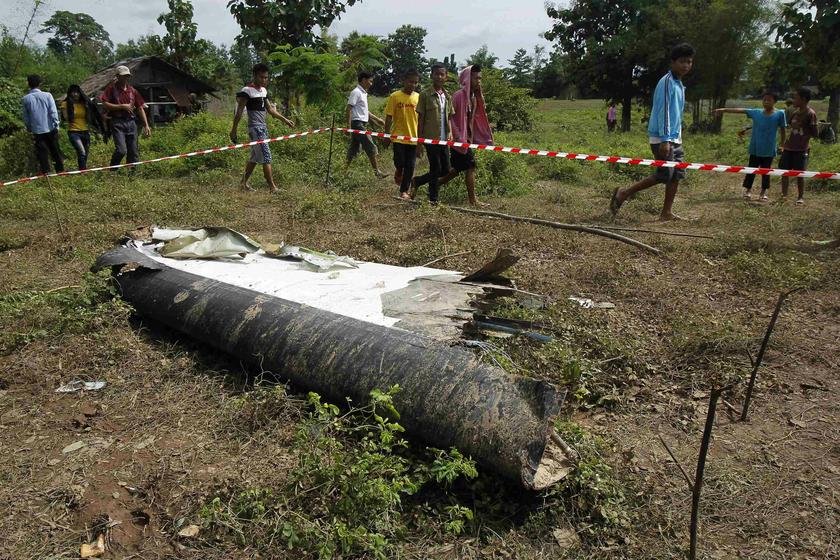 People arrive at the crash site of an ATR-72 turboprop plane, in Laos, near Pakse October 17, 2013. u00e2u20acu201d Reuters pic