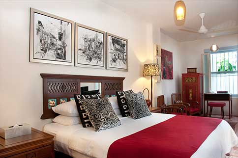 The rooms are a combination of modern facilities for comfort with antique furnitures