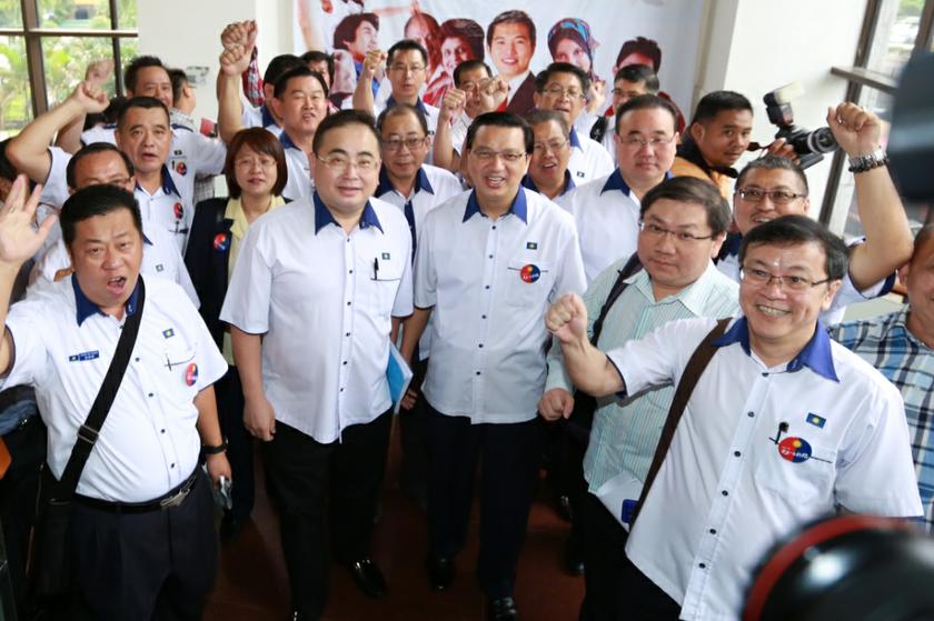 Dato' Sri Liow Tiong Lai and Datuk Ir. Dr. Wee Ka Siong arriving at the MCA building December 16 2013. Picture by Saw Siow Feng