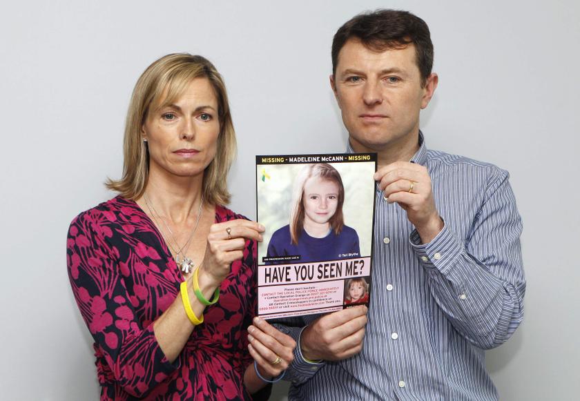 Kate and Gerry McCann are seen posing with a computer generated image of how their missing daughter Madeleine might look, during a news conference in London in this May 2, 2012 file photograph.  u00e2u20acu201d Reuters pic