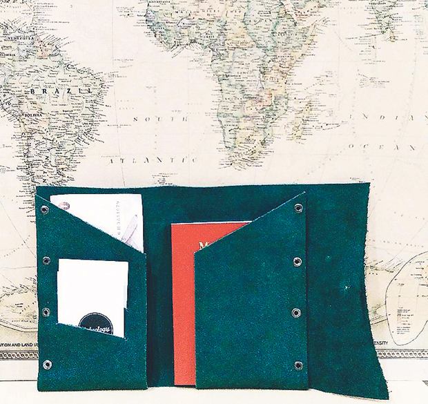 Pet Projek crafts leather goods such as this travel wallet