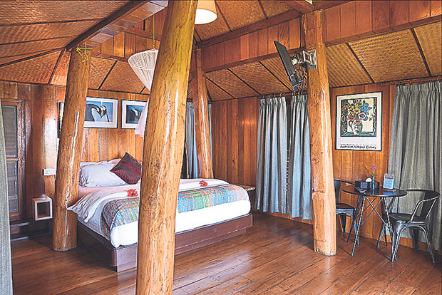 This is an original rice barn from Thailand that was converted into chalets for guests at Malihom