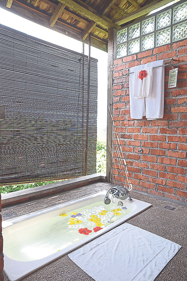 Some of the chalets have open air bathrooms where they face the stunning view of the hill