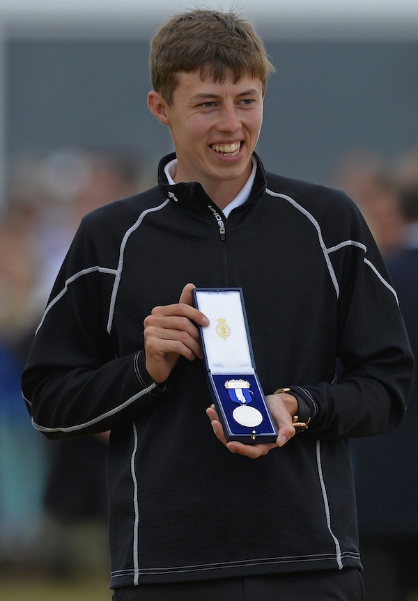 Amateur Matthew Fitzpatrick of England poses with the silver medal for the leading amateur, after the final round of the British Open golf championship at Muirfield in Scotland July 21, 2013. u00e2u20acu201d Reuters pic