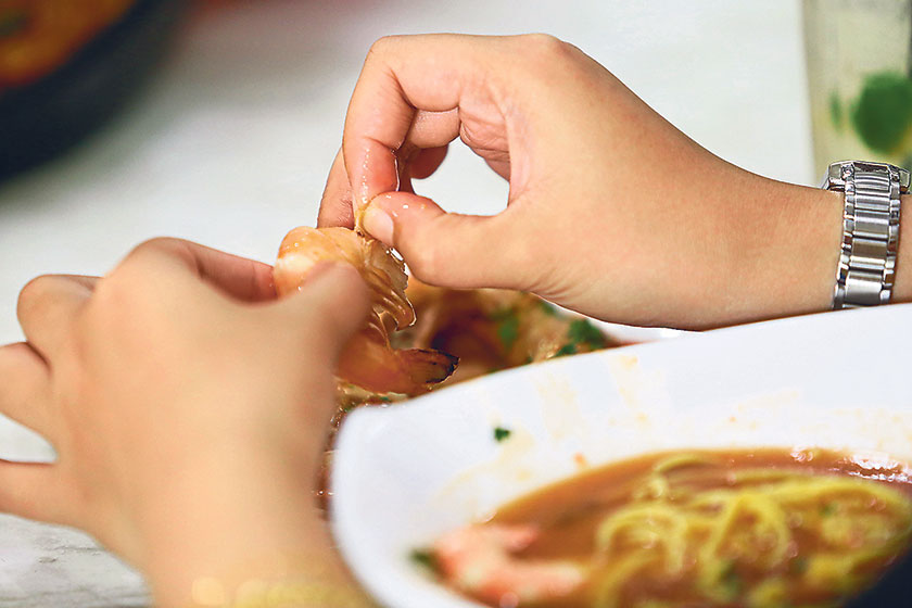 Get your hands dirty to peel and relish the fresh firm prawns