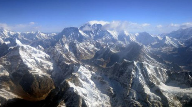 Mount Everest is the Earth's highest mountain, with a peak at 8,848 metres above sea level and the fifth tallest mountain measured from the centre of the Earth. u00e2u20acu201d AFP pic