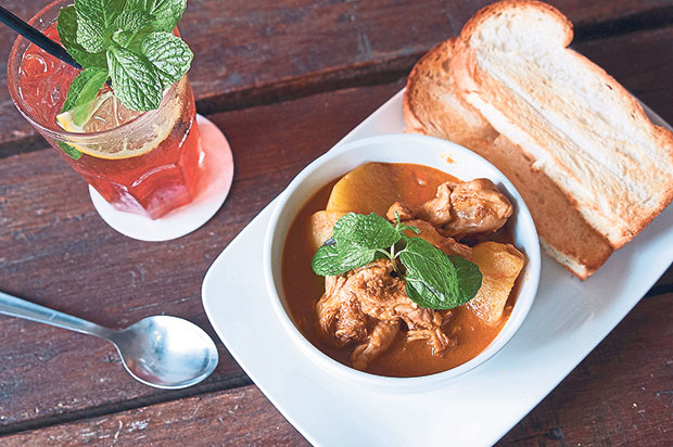 A taste of local flavours..home brewed nutmeg soda, curry chicken served with toasted roti benggali