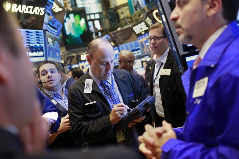 Traders work on the floor of the New York Stock Exchange. u00e2u20acu201dReuters pic