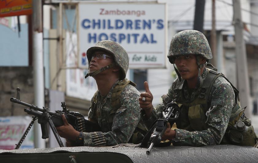 Philippine rebels stage attack just before Christmas truce. December 24, 2013 u00e2u20acu2022 Reuters pic