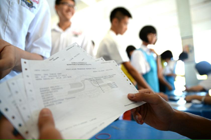Penilaian Menengah Rendah students at SMJK Jit Sin queing to get their result today joining other student all over Malaysia to receive their PMR examination results in Penang, December 19, 2013. u00e2u20acu201du00c2u00a0Picture by K.E. Ooi