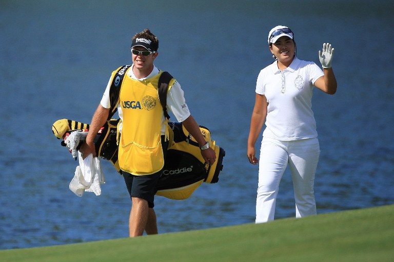  In-Bee Park of South Korea walks up the 18th fairway. u00e2u20acu201c AFP pic
