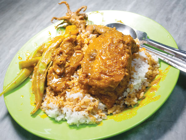 A plate of nasi kandar from the stall at Wah Meng Coffee Shop is like a home-cooked meal, not a commercial nasi kandar stall.