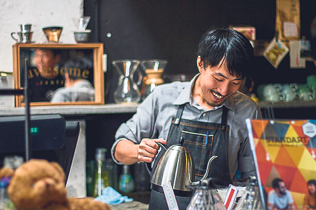 Barista Joachim Leong brewing coffee at Spacebar Coffee