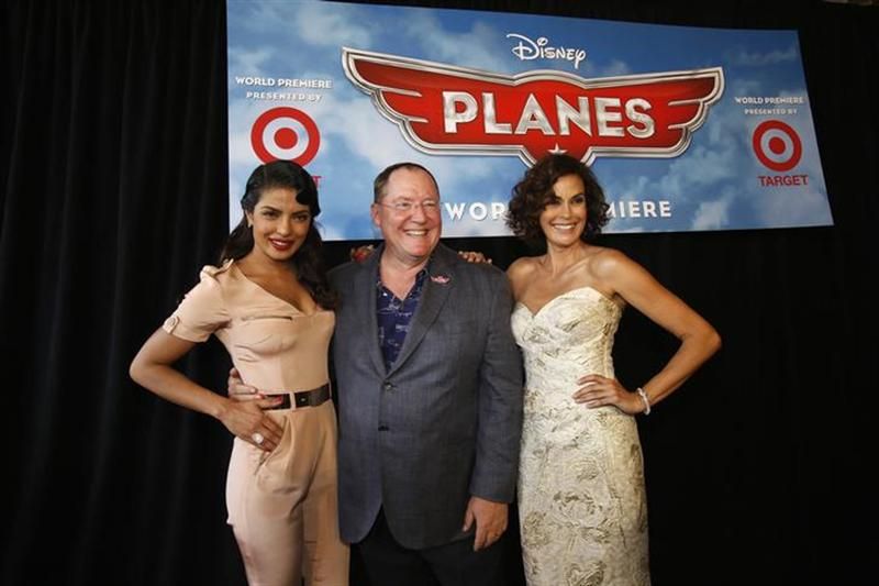John Lasseter, Chief Creative Officer at Pixar and Walt Disney animation studios, poses with actress Teri Hatcher (right), who voices the character of u00e2u20acu02dcDottieu00e2u20acu2122, and Priyanka Chopra, who voices the character of u00e2u20acu02dcIshaniu00e2u20acu2122, at the world premiere of u00e2u20ac