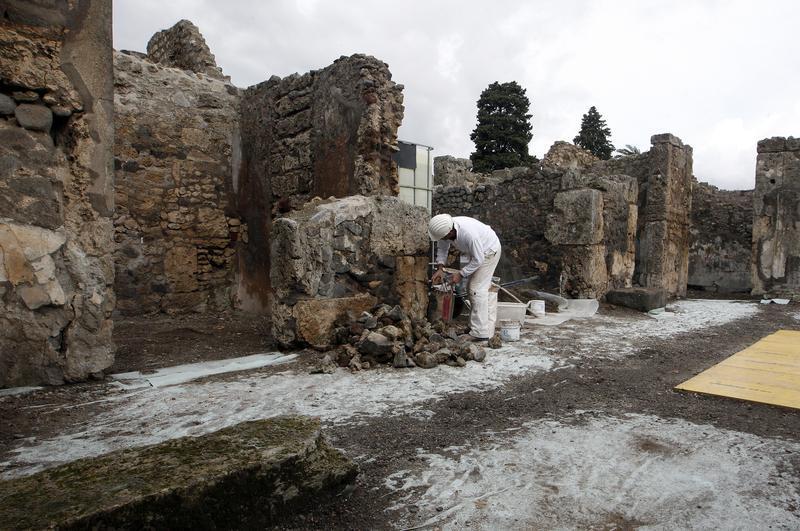 A restorer works in the ancient Roman city Pompeii, which was buried in AD 79 by an eruption of the Vesuvius volcano, February 6, 2013. u00e2u20acu201d Reuters pic