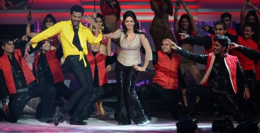 Indian Bollywood actors Prabhudeva and Sridevi Kapoor perform during the awards show. — AFP pic
